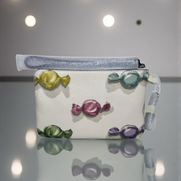 Coach Handbags - COACH- NWT - Corner Zip Wristlet in Signature Leather w Heart Charm. In Plastic